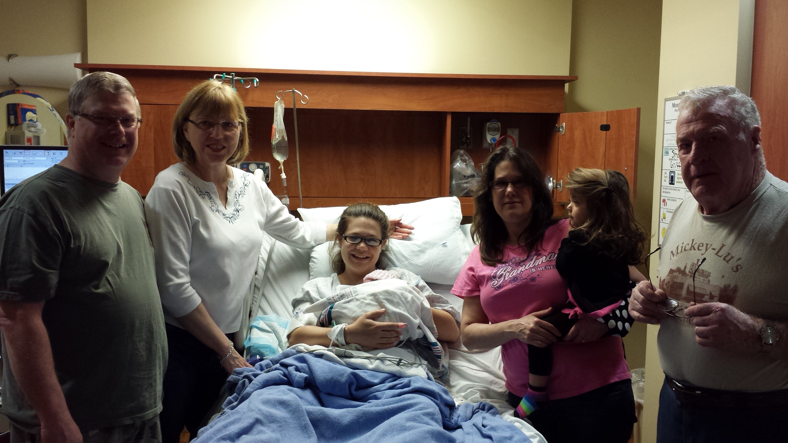 Family group photo in the birthing suite after Chloe's birth