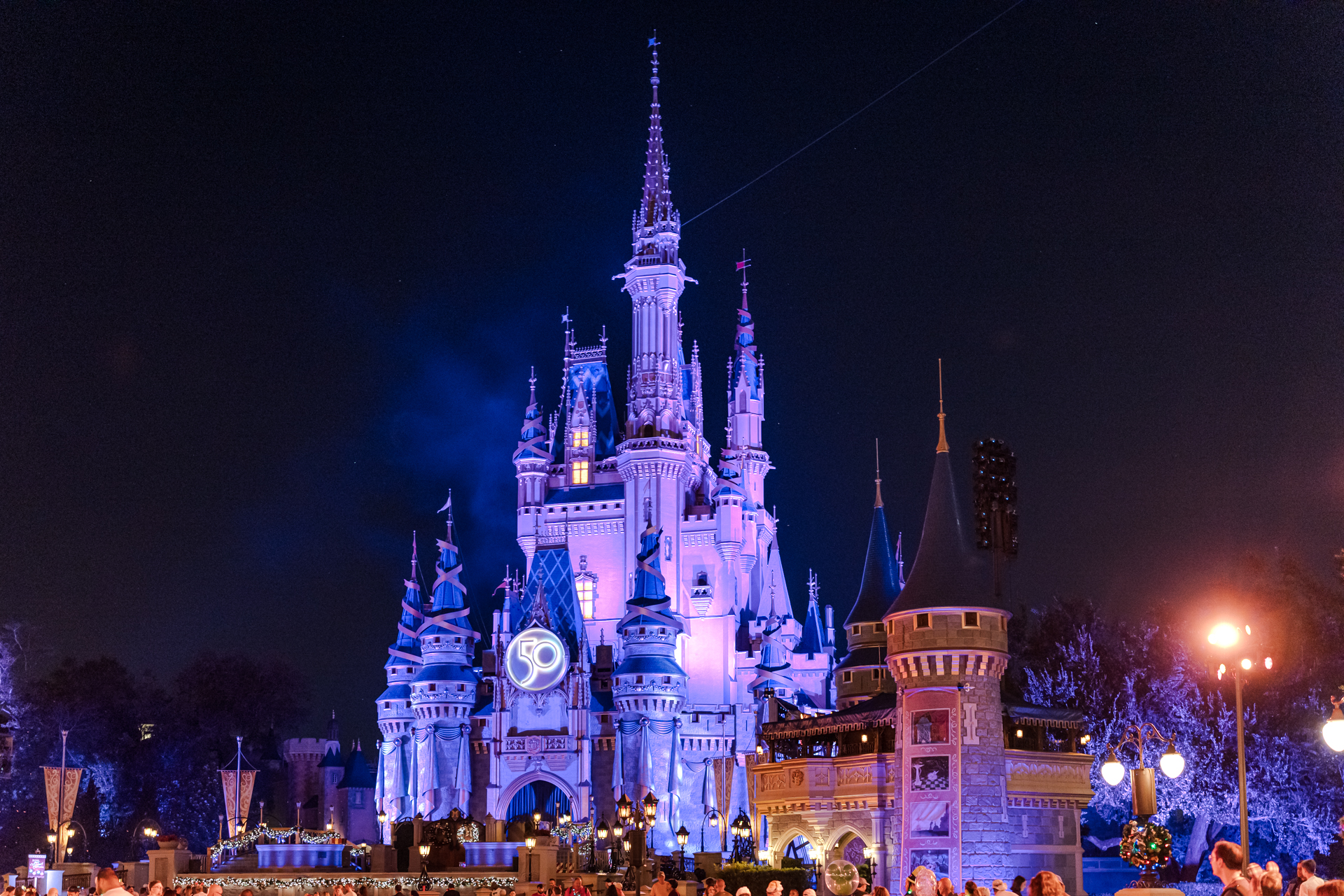 Cinderella's Castle during the 50th Anniversary Celebration. SDR (JPG) | Sony a7R IVA | Tamron 35-150mm | 1/40 sec, f/2, ISO 2500